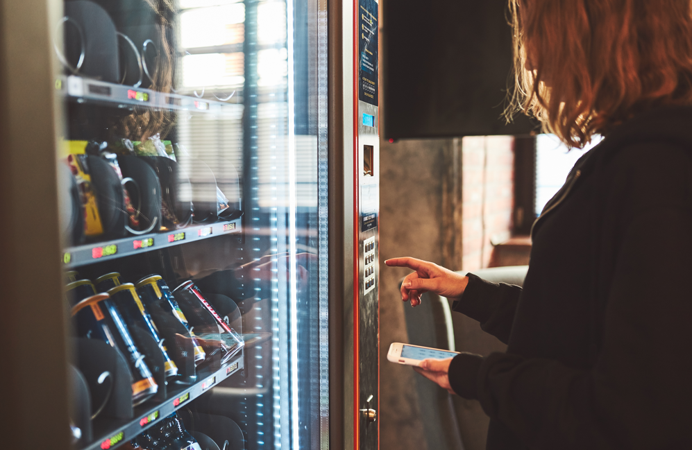 customer at vending machine