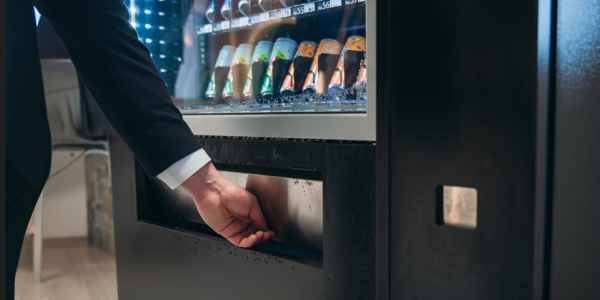 reaching in vending machine